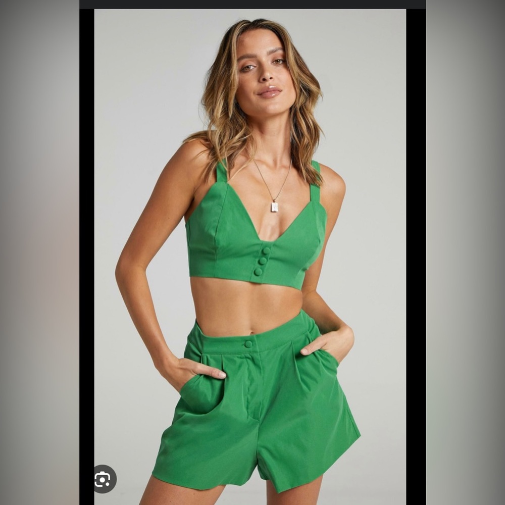 Green shorts and crop top coord set with button accents